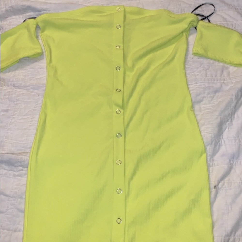 Bright yellow, short, off the shoulder strapped dress